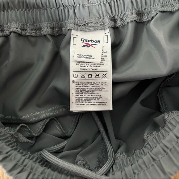 REEBOK sz S Wonder Women Gray Woven Track Pants Sheer Panels Reflective Piping - Picture 8 of 9